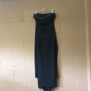 Vintage quality black strapless dress with feather detail